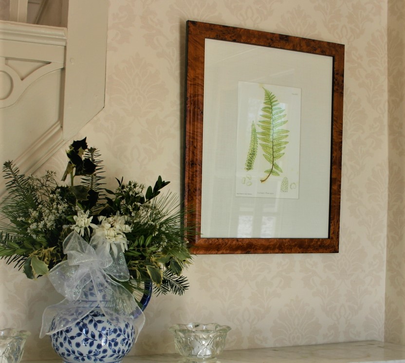 Fern Image in a Frame with base of dried flowers next to it