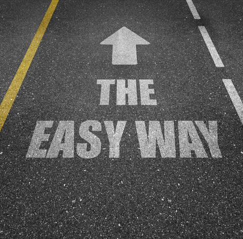 A highway with the Words "The easy way" and an arrow pointing up