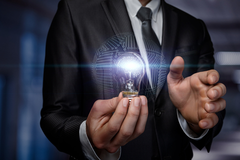 AI Image, man holding a digital lightbulb