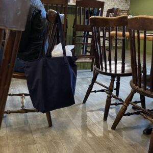 Image of chairs in a restaurant to close together